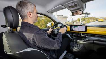 Richard Ingram driving the Fiat 500 Hybrid Torino